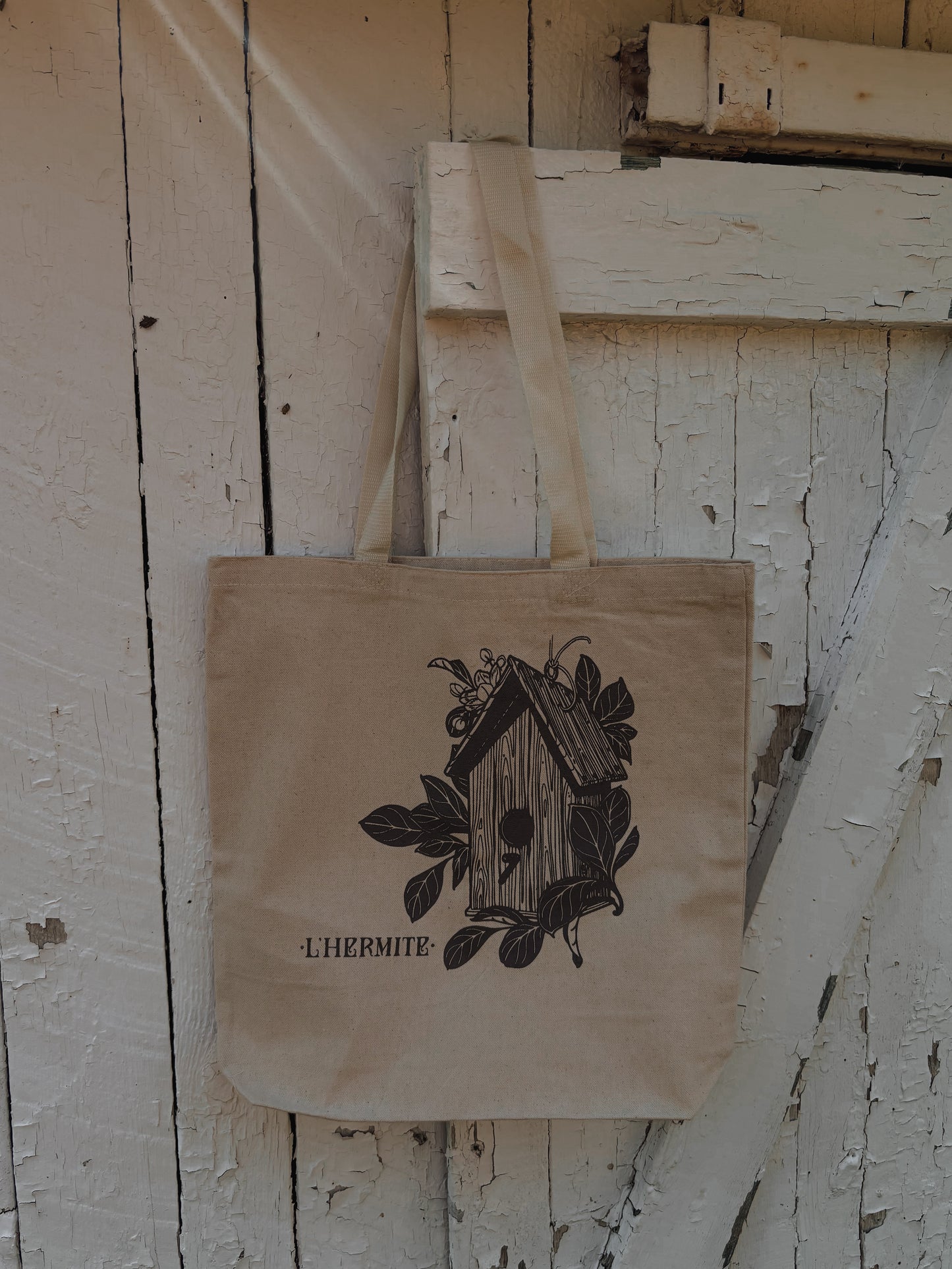 Bird house screen printed on a canvas tote bag