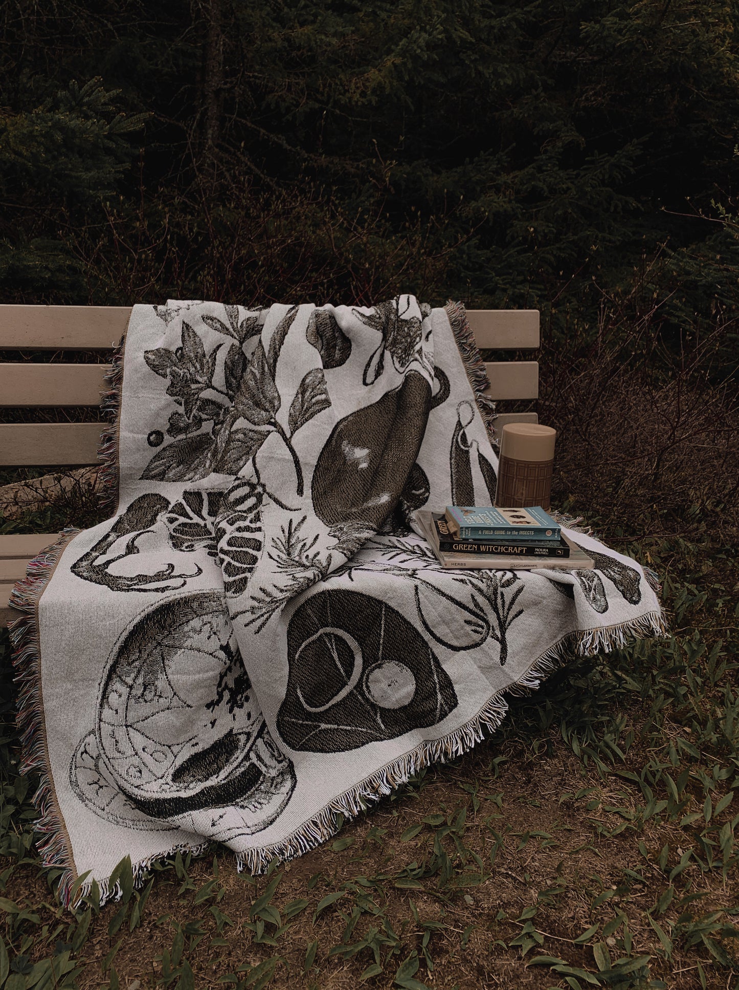 Witchcraft and nature merge onto this 100% cotton woven tapestry blanket