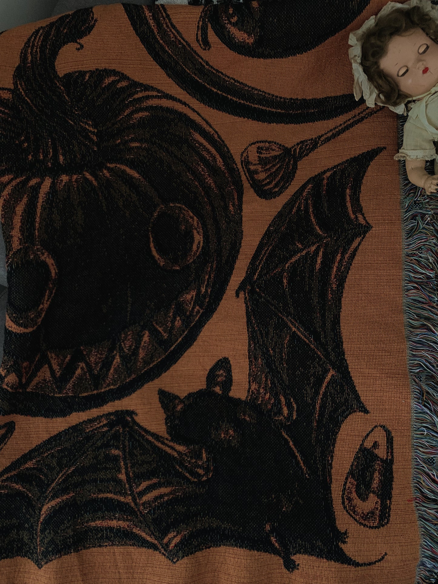 Classic halloween imagery woven into a 100% cotton blanket