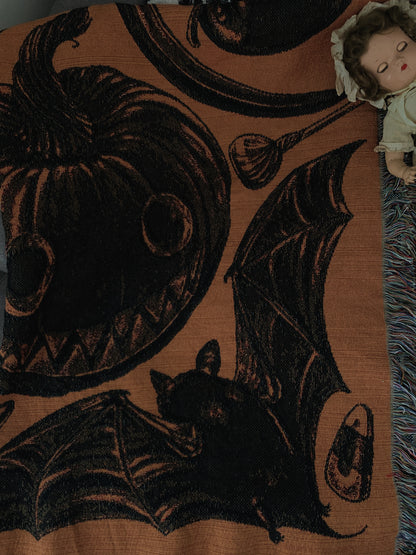 Classic halloween imagery woven into a 100% cotton blanket